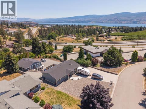 Sideview of property at 3728 - 3724 Glenway Road, Glenrosa, West Kelowna
