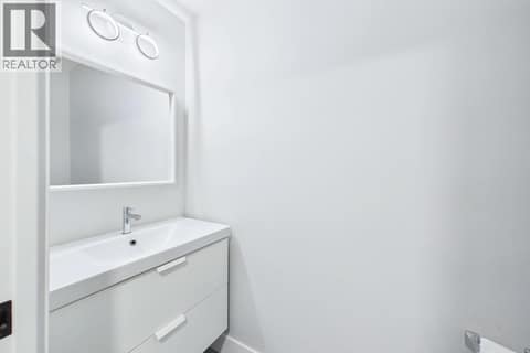 Lower Level Powder Room at 439 Redtail Court, Kettle Valley, Kelowna