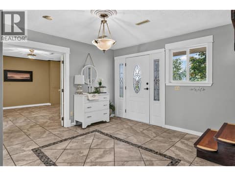 Large foyer for the hello and goodbye hugs! at 2848 Inverness Road, Glenrosa, West Kelowna