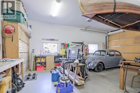 3 Vehicle Garage (1 RV Height door) at 6709 VICTORIA Road S Unit# 6, Summerland Rural