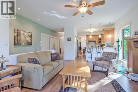 Family Room at 6709 VICTORIA Road S Unit# 6, Summerland Rural