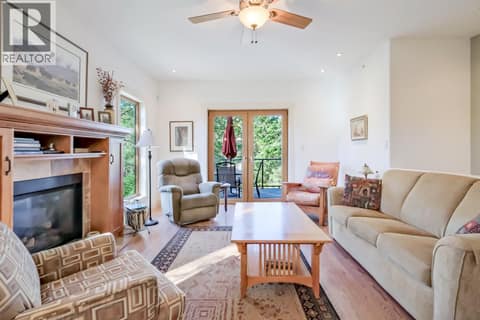 Family Room with Gas Fireplace at 6709 VICTORIA Road S Unit# 6, Summerland Rural