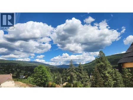 View looking towards Silver Star from kitchen. at 7110 Bates Road Unit# 26, Foothills, Vernon