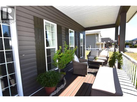 Covered front lower deck at 535 Loon Avenue, Okanagan North, Vernon