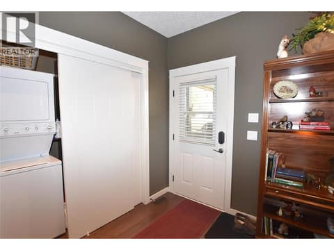 Mud room with door to back deck at 535 Loon Avenue, Okanagan North, Vernon