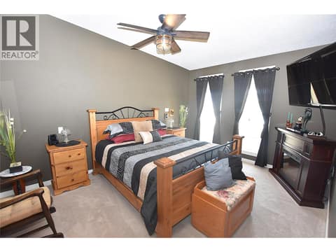 Upper floor primary bedroom at 535 Loon Avenue, Okanagan North, Vernon