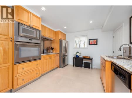 Lower level kitchen at 8615 Okanagan Landing Road, Okanagan Landing, Vernon
