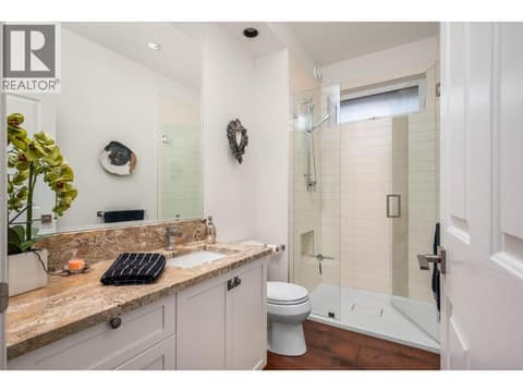 Main floor bathroom at 8615 Okanagan Landing Road, Okanagan Landing, Vernon
