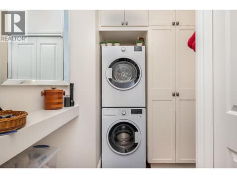Main floor laundry and pantry at 8615 Okanagan Landing Road, Okanagan Landing, Vernon