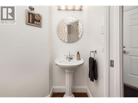 Main floor powder room at 8615 Okanagan Landing Road, Okanagan Landing, Vernon