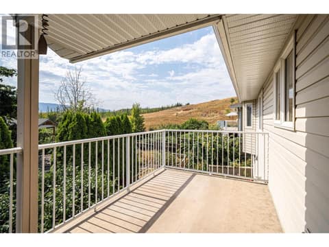 Balcony off the dining room at 5804 Richfield Drive, Westmount, Vernon