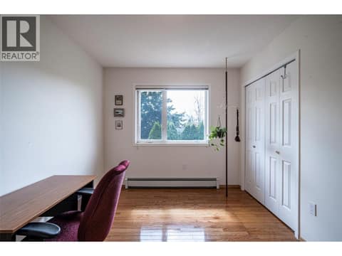 Bedroom 1 on main floor at 5804 Richfield Drive, Westmount, Vernon
