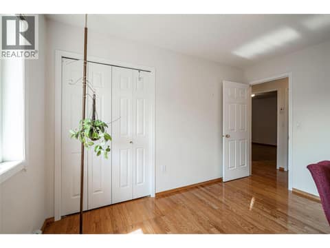 Bedroom 1 on main floor at 5804 Richfield Drive, Westmount, Vernon