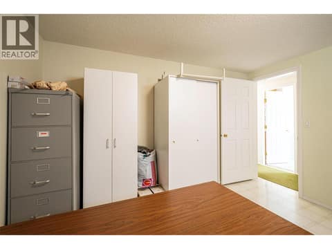 Laundry room on basement level at 5804 Richfield Drive, Westmount, Vernon