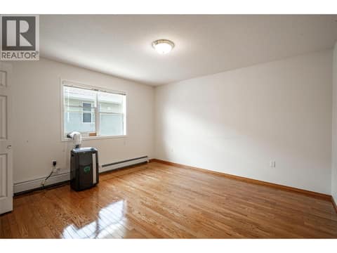 Primary bedroom on main floor at 5804 Richfield Drive, Westmount, Vernon