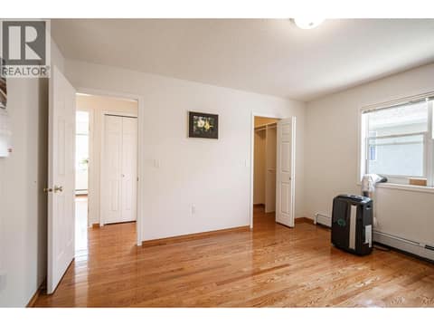 Primary bedroom on main floor at 5804 Richfield Drive, Westmount, Vernon