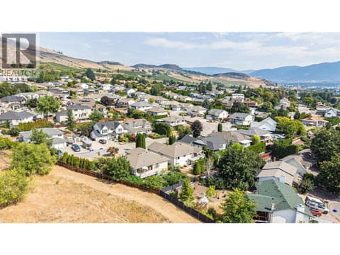 Situated in the beautiful Bella Vista area of Vernon at 5804 Richfield Drive, Westmount, Vernon
