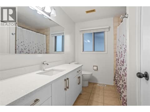 Main Bathroom with Bathtub at 1730 Simpson Court, Rutland South, Kelowna