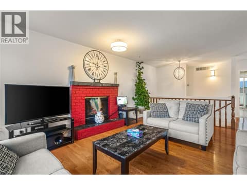 Main Living Room with Gas Fireplace at 1730 Simpson Court, Rutland South, Kelowna