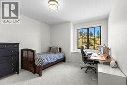 Another second storey bedroom with large closets at 74 Red Sky Court, Wilden, Kelowna
