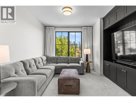 Family theatre room at 74 Red Sky Court, Wilden, Kelowna