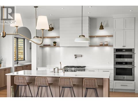 Floating shelves on rear wall with accent lighting at 74 Red Sky Court, Wilden, Kelowna