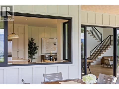 Indoor / outdoor open bar area at 74 Red Sky Court, Wilden, Kelowna