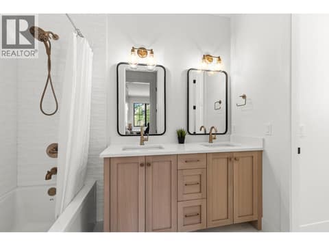 Main upper bathroom with water closet at 74 Red Sky Court, Wilden, Kelowna