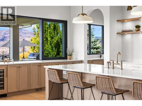 Seemless indoor outdoor bar area at 74 Red Sky Court, Wilden, Kelowna