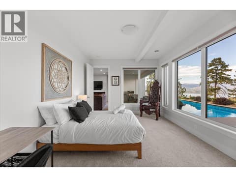 1st bedroom downstairs, with ensuite and spacious closet at 980 Ledgeview Court, Upper Mission, Kelowna
