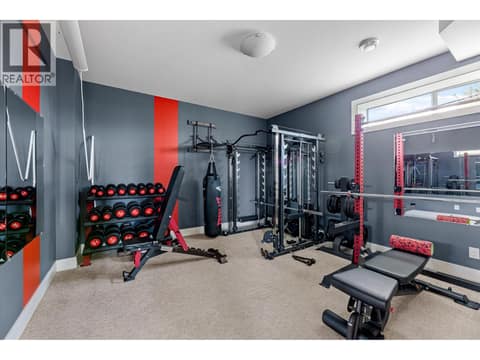 3rd downstairs bedroom being used as fitness space at 980 Ledgeview Court, Upper Mission, Kelowna