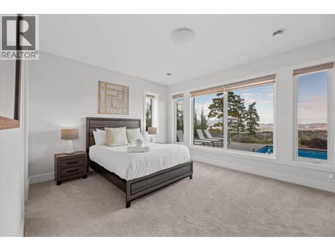 4th downstairs bedroom with ensuite and walk in closet at 980 Ledgeview Court, Upper Mission, Kelowna