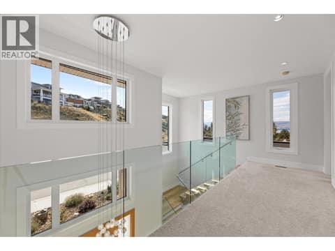 Ample windows to maximize natural light at 980 Ledgeview Court, Upper Mission, Kelowna