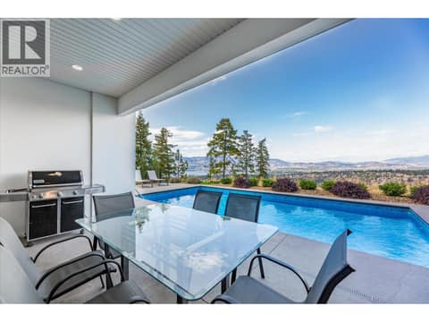 Covered deck next to the pool at 980 Ledgeview Court, Upper Mission, Kelowna