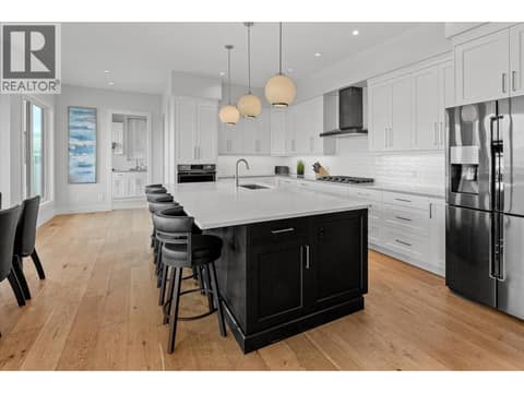 Wide plank white oak flooring through out the main floor at 980 Ledgeview Court, Upper Mission, Kelowna