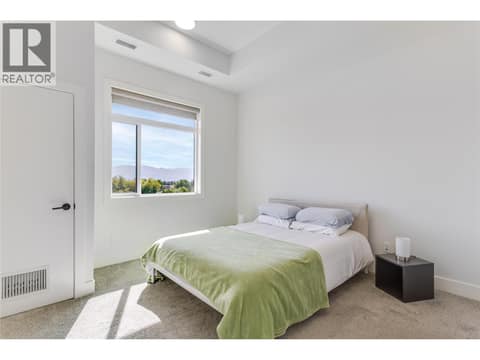 Spacious primary bedroom at 1220 Pacific Avenue Unit# 507, Springfield/Spall, Kelowna
