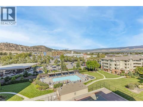 Overlooking Park Place pool and the Okanagan valley at 1967 Underhill Street Unit# 705, Springfield/Spall, Kelowna