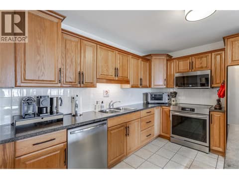 Spacious kitchen, newer countertops at 1967 Underhill Street Unit# 705, Springfield/Spall, Kelowna