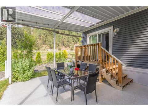 Backyard patio area at 1835 Nancee Way Court Unit# 48, West Kelowna Estates