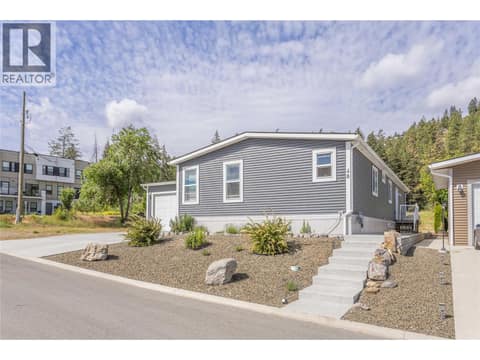 Enjoy the ease of low maintenance landscaping in the front yard. at 1835 Nancee Way Court Unit# 48, West Kelowna Estates