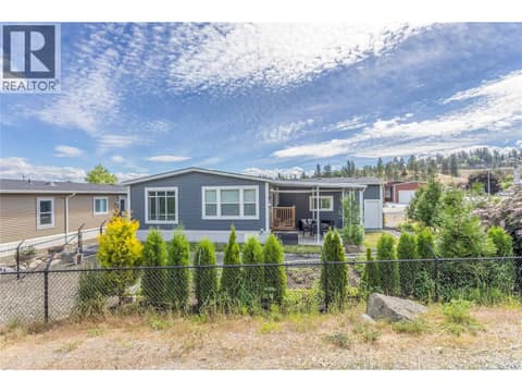 View of the back of the property at 1835 Nancee Way Court Unit# 48, West Kelowna Estates