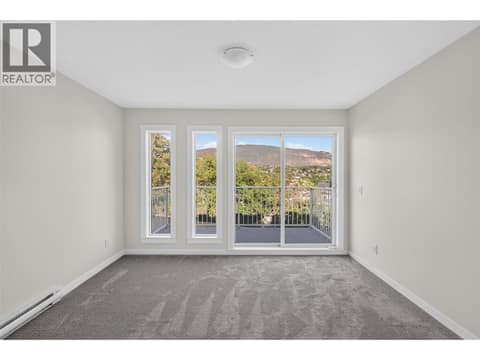Living Room at 4004 34 Street Unit# 206, Alexis Park, Vernon