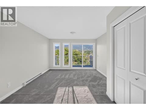 Living Room at 4004 34 Street Unit# 206, Alexis Park, Vernon