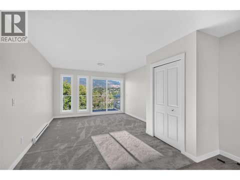Living Room at 4004 34 Street Unit# 206, Alexis Park, Vernon