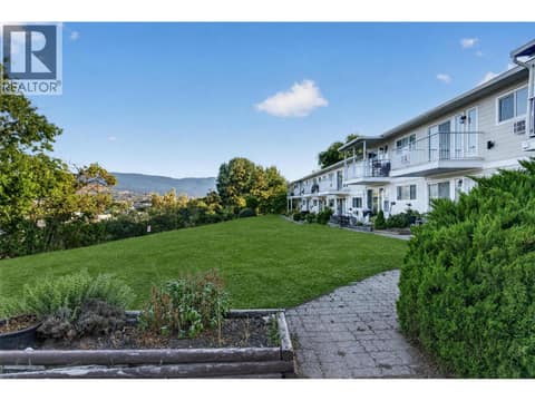 Outside grass has been altered to be greener. at 4004 34 Street Unit# 206, Alexis Park, Vernon
