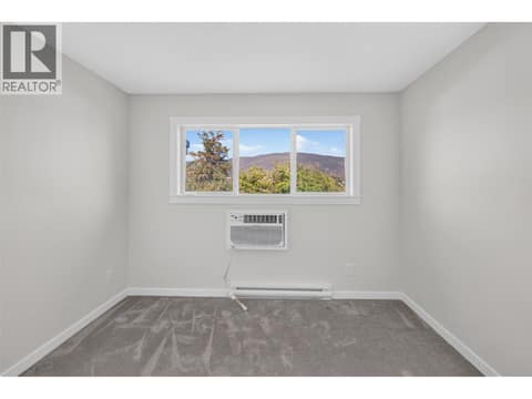 Primary Bedroom at 4004 34 Street Unit# 206, Alexis Park, Vernon