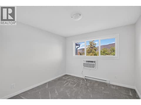 Primary Bedroom at 4004 34 Street Unit# 206, Alexis Park, Vernon