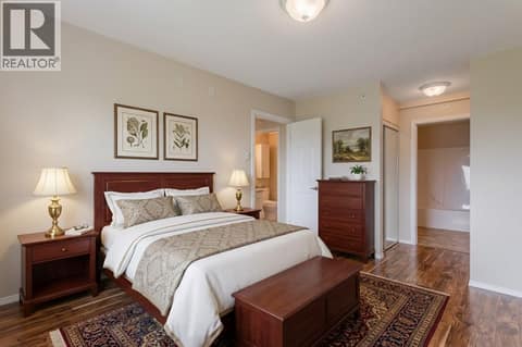 Virtually staged primary bedroom at 250 Dougall Road N Unit# 405, Rutland North, Kelowna