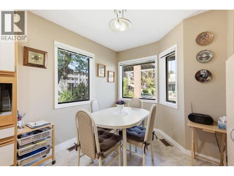 Cozy breakfast nook off the kitchen with plenty of windows at 1765 Leckie Road Unit# 201, Springfield/Spall, Kelowna