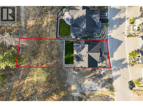 .17-acre lot backing onto the hillside, ideally situated on a quiet, no-thru road in the family-friendly Wilden community at 1448 Whistling Pine Place, Wilden, Kelowna